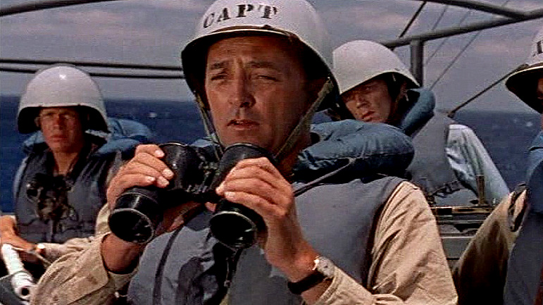 The Enemy Below (1957) depicts the cat-and-mouse struggle between an American destroyer escort and a German U-Boat at the height of WW2. Ultra tight naval combat movie, written by a decorated British captain.