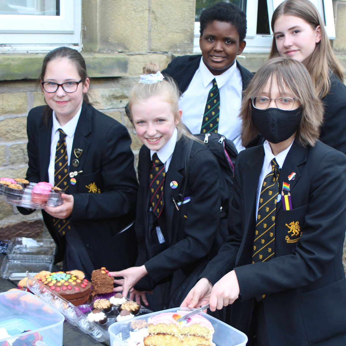 CHSupdates's tweet photo. #CHS are proudly flying the flag for #Pride month.  Yesterday our #DiversityGroup hosted a🌈bake sale &amp; face painting event to raise funds for LGBTQ+ charities @AKTCharity &amp; @TheProudTrust. Well done and thank you to all involved 🏳️‍🌈@CHS_MFL #LovingGod #CaringForEachOther https://t.co/k9KSueWdEV