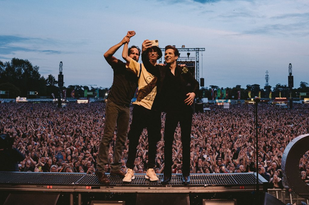 thekillers's tweet photo. Last night was touched by a bit of Irish luck, brightened by a song in our hearts, and warmed by the smiles of the people we love. Let’s do it again! https://t.co/n8fy6jifLi