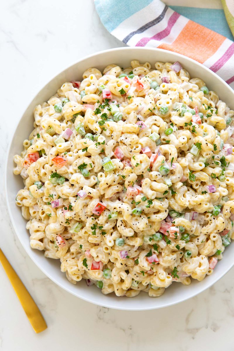 This old-fashioned Classic Macaroni Salad is an easy and delicious make-ahead side dish.  It serves a crowd and is perfect for potlucks, cookouts and summer picnics!  🌞 bit.ly/39oCFpq