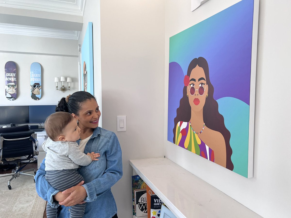 My son loves staring at my #worldofwomennft! Is it possible that he thinks she is me?🥰