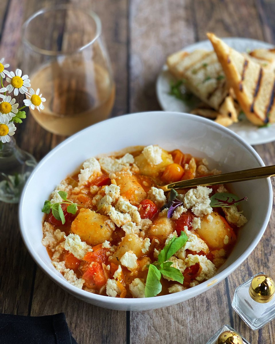 Tomato Feta Gnocchi🍅Our summer menu drops tonight and gnocchi is back! Plump potato dumplings in fresh tomato sauce with lots of garlic and fresh basil then topped with almond feta. Feels like home🧡