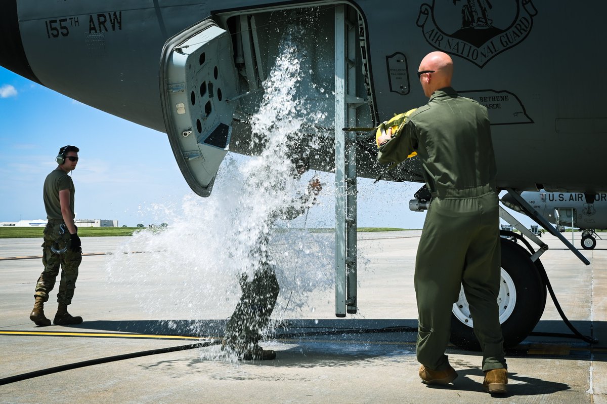 NENationalGuard's tweet photo. Have you ever heard of a #FiniFlight?
Fini-flight, a tradition dating back to World War II, is where aircrew members celebrate their last flights. Once the member finishes their flight and emerges from the jet, they are met with water hoses, champagne and hugs. https://t.co/wqzvjo1dnX