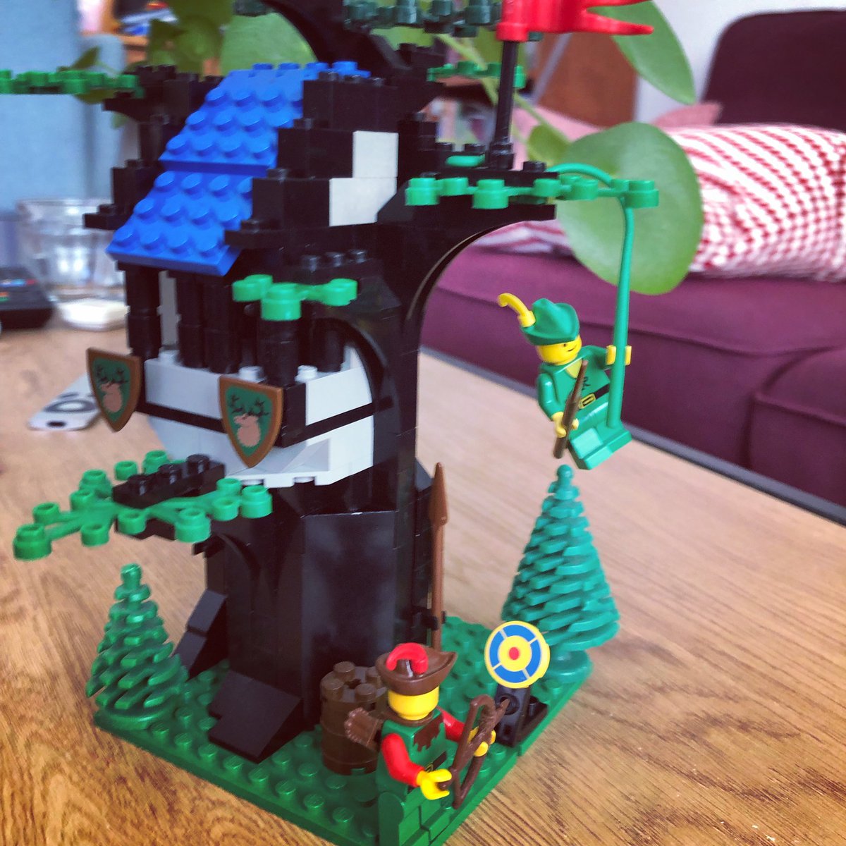 kurai77's tweet photo. Apparently if you spend enough money in the Lego store you get a remake of the 6054 forestmen hideout, so I built mine today, missing some leaves but got replacements in a darker green. #afol #lego #forestmen #bricks https://t.co/ABEj93eHjE