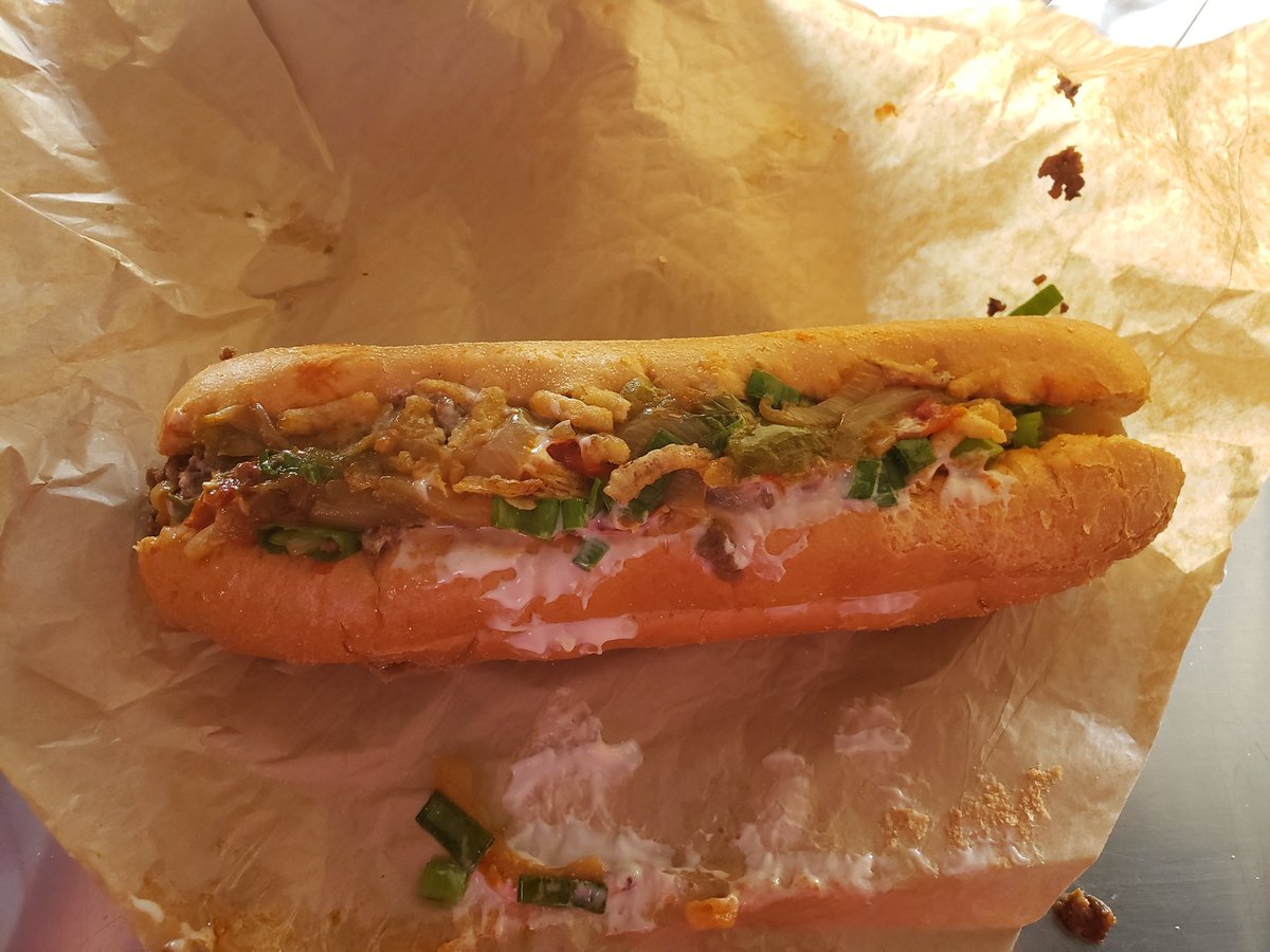 MLBFoodie's tweet photo. I saw this was added to the menu for this year but this is the Impossible Cheesesteak at #citizensbankpark. Whether you eat Impossible Meat or not, its a must buy. (1/2) #phillies #ringthebell #smashthebell #phillycheesesteaks #philadelphia #mlbfoodie #mlbfood @philliesphood1 https://t.co/oncO9xQM5T