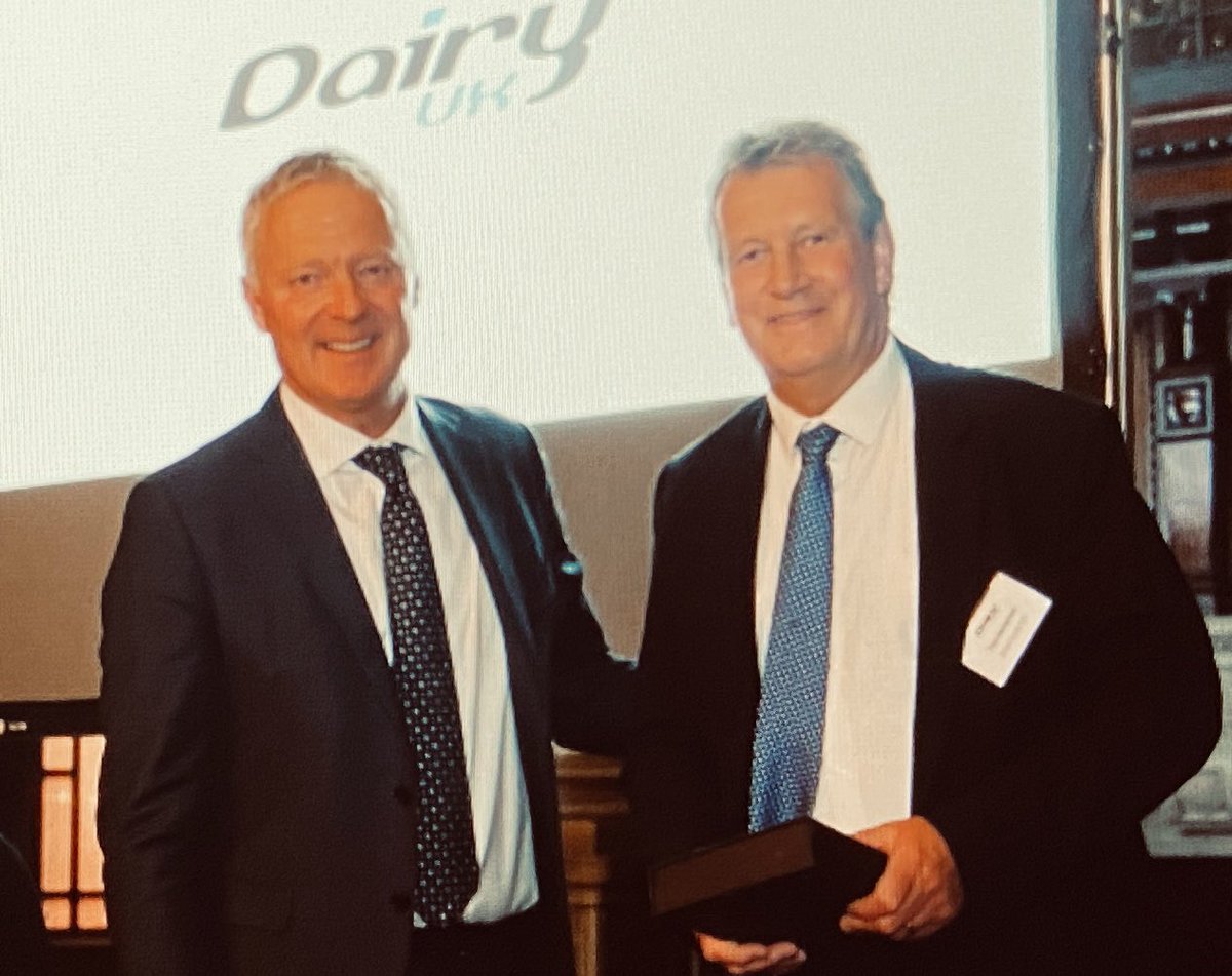 dairyuk's tweet photo. Rory Bremner presents the Dairy UK Award 2022 to Tim Hampton at the Dairy UK dinner. Congratulations Tim! https://t.co/4t235BMMsO
