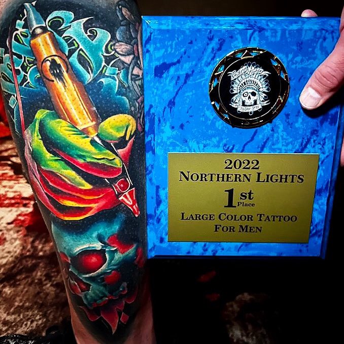 aonmerch's tweet photo. “Best Large Color Tattoo” award given to @BrandonBond at the Minnesota Tattoo Convention Last weekend. Tattoo is healed for 2 years! 

https://t.co/ezAghni2PT https://t.co/H06VMlq5SH