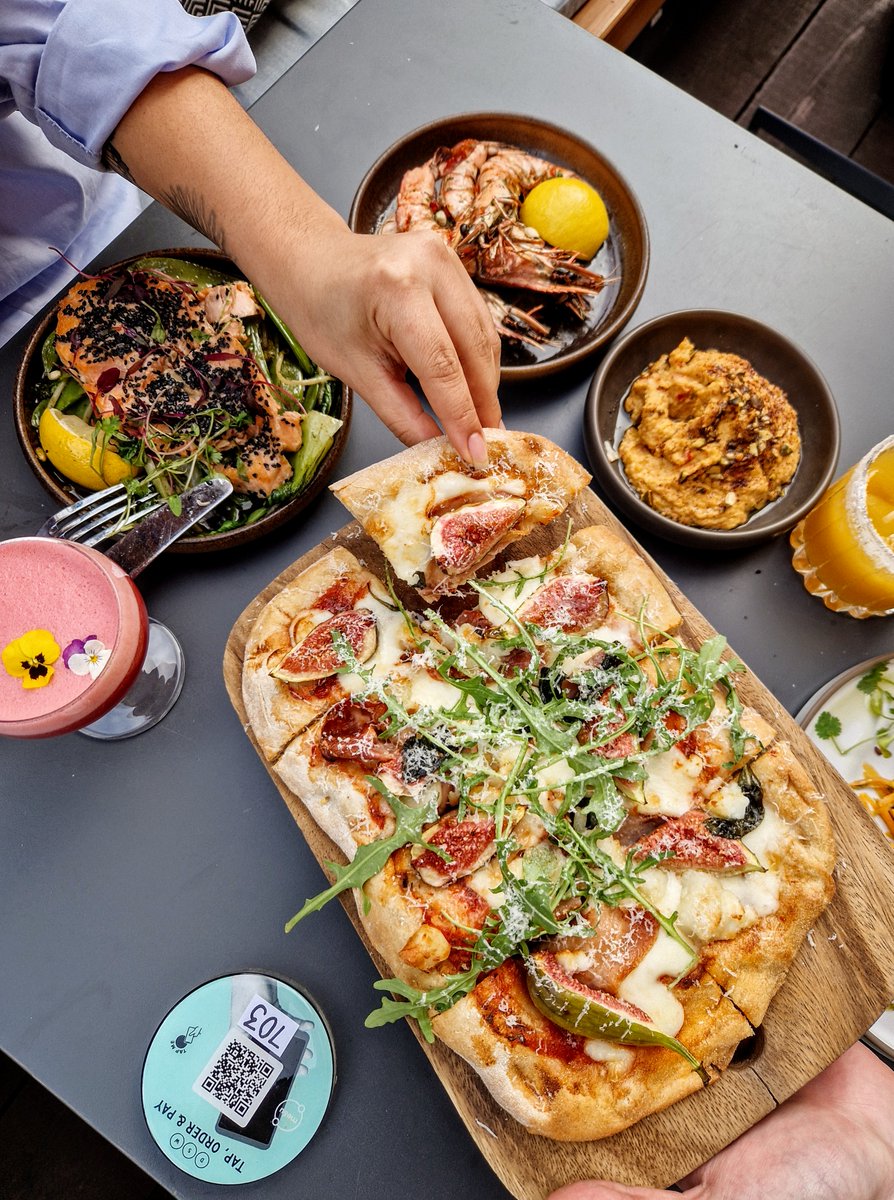 Summer sun at Ducie ☀️ The focaccia Romana style flatbread is a table must from our terrace menu. Great for sharing with friends along with a few bevs! OPEN FOR SERVICE 12pm #DucieStreet