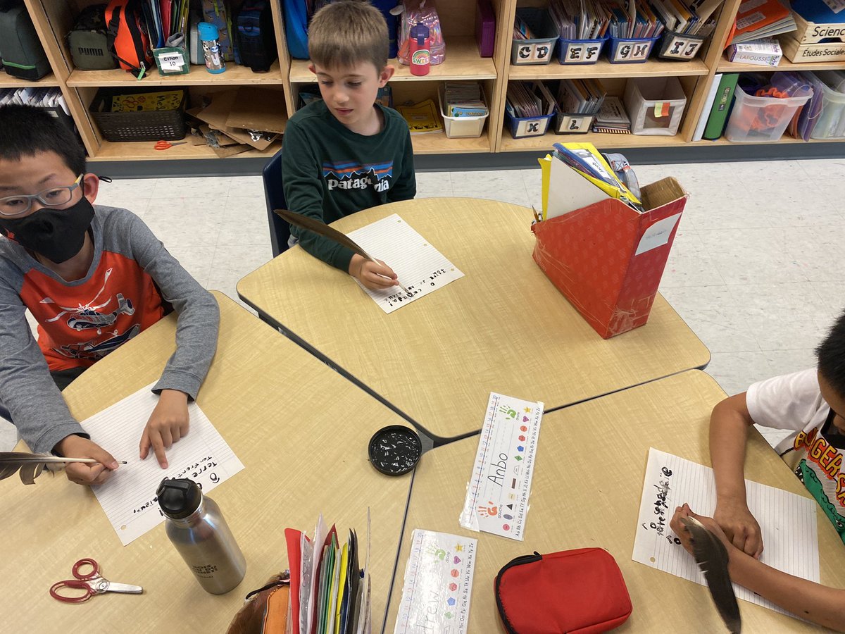 AnneSeniuk's tweet photo. Today we are going back in time and trying to write with goose feathers like pioneers did in in the 1800s. Not as easy as it looks!! We should have copied “God saves the king” but copying “O Canada” makes it more meaningful for us!
@KanataHighlands https://t.co/6V4btvI8lk