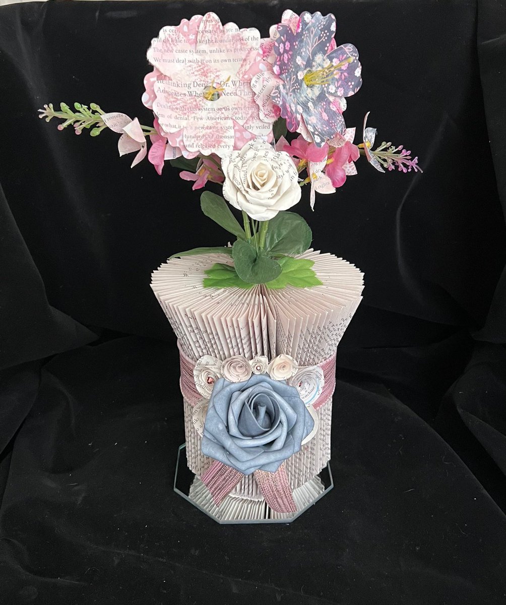Excited to share this item from my #etsy shop: #FlowerVase #FoldedBookArtSculpture a perfect #gift for anyone!  #booklover #homedecor #paperflowers #tablecenterpiece #books #bookfolding #weddinggift #fathersday #birthdaygift #recycledart #giftideas etsy.me/3MVTt54