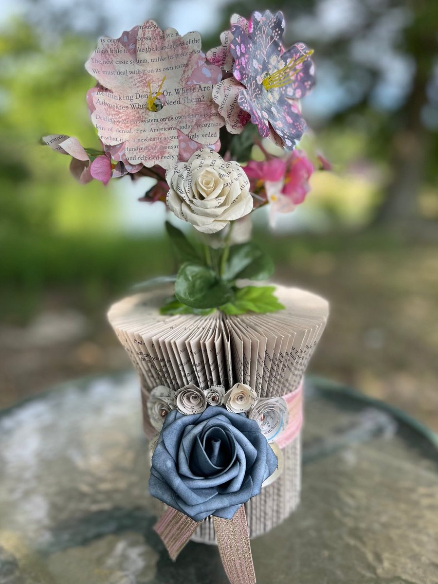 Excited to share this item from my #etsy shop: #FlowerVase #FoldedBookArtSculpture a perfect #gift for anyone!  #booklover #homedecor #paperflowers #tablecenterpiece #giftideas #books #giftideas #recycledart #recycledreads #foreverflowers etsy.me/3MVTt54