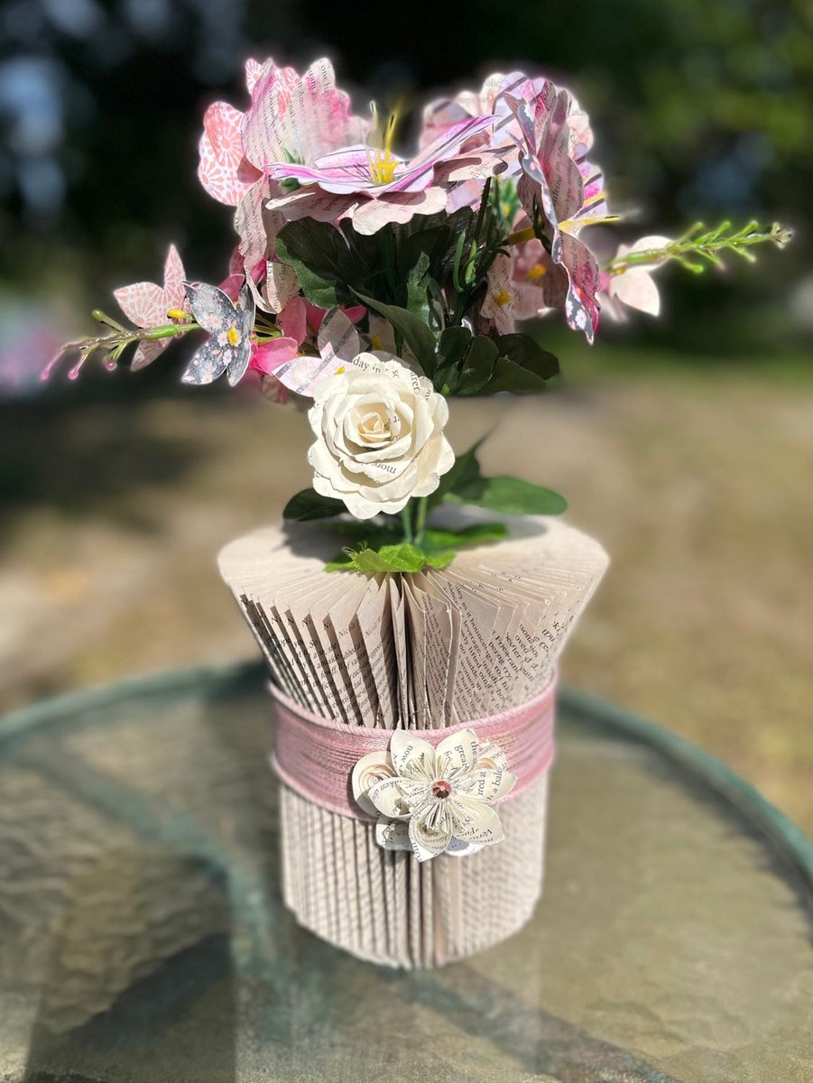 Excited to share this item from my #etsy shop: #FlowerVase #FoldedBookArtSculpture a perfect #gift for anyone!  #booklover #homedecor #paperflowers #tablecenterpiece #giftideas #books #giftideas #recycledart #recycledreads #foreverflowers etsy.me/3MVTt54