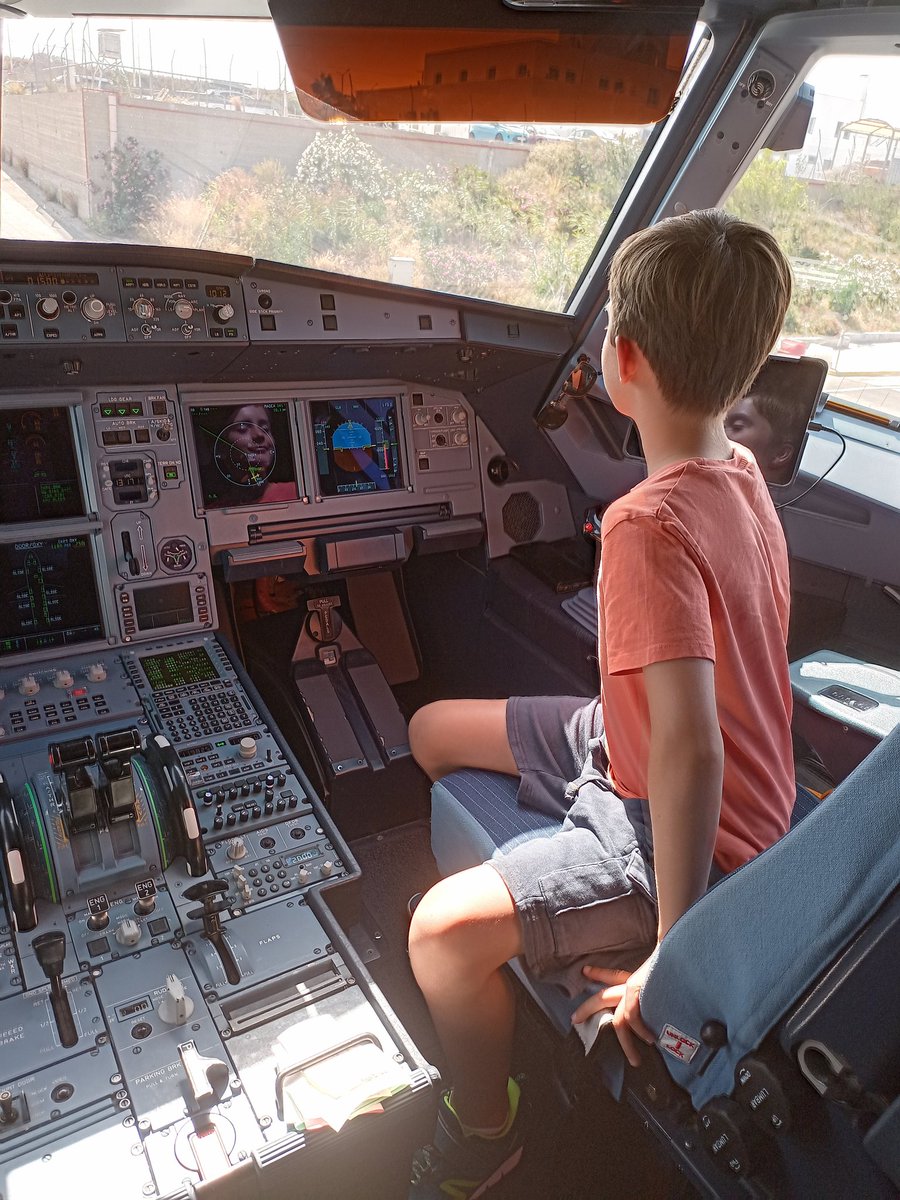 Just getting ready to fly back from Santorini. Anyone got a cushion so I can see out the window easier?