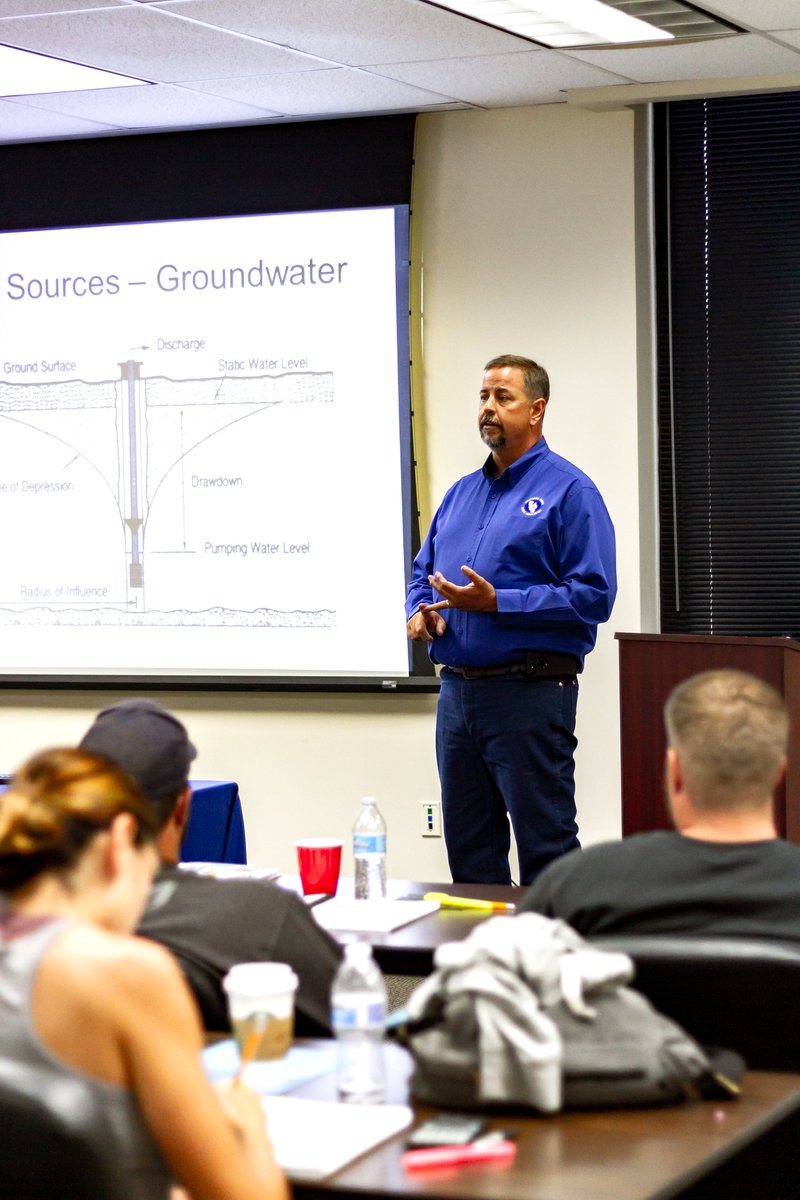 CalRural's tweet photo. It's #ThrowbackThursday so let's take a trip down memory lane. Since our in-person cert review courses are coming up, here's a little throwback of Jon Curry teaching the Treatment Cert review class in 2018. 
#NRWA #tbt #waterops #ruralwater #wateroperator https://t.co/4AlLA0CIOI