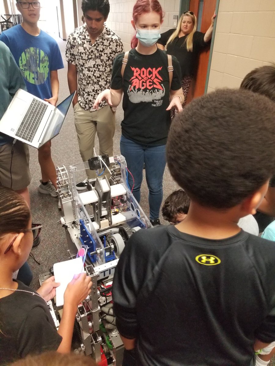 TCodecamp's tweet image. THS Robotics Team demos their amazing robot to our Coding Campers!  @frc7312