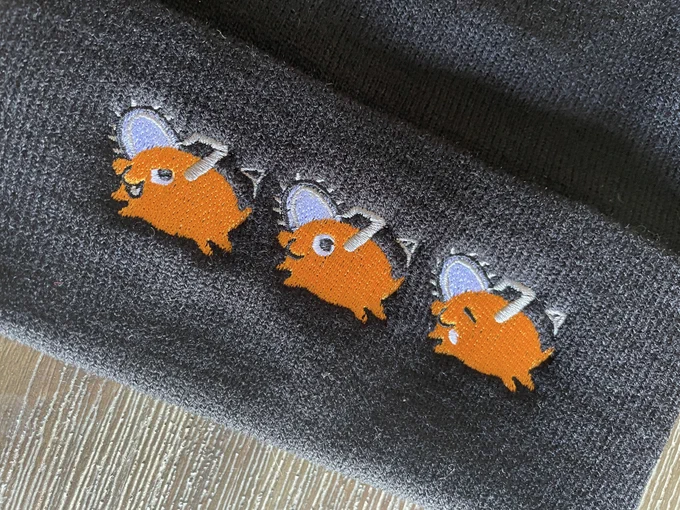 In the vein of funny little weird dogs, I also made a pochita beanie. Three of him! 