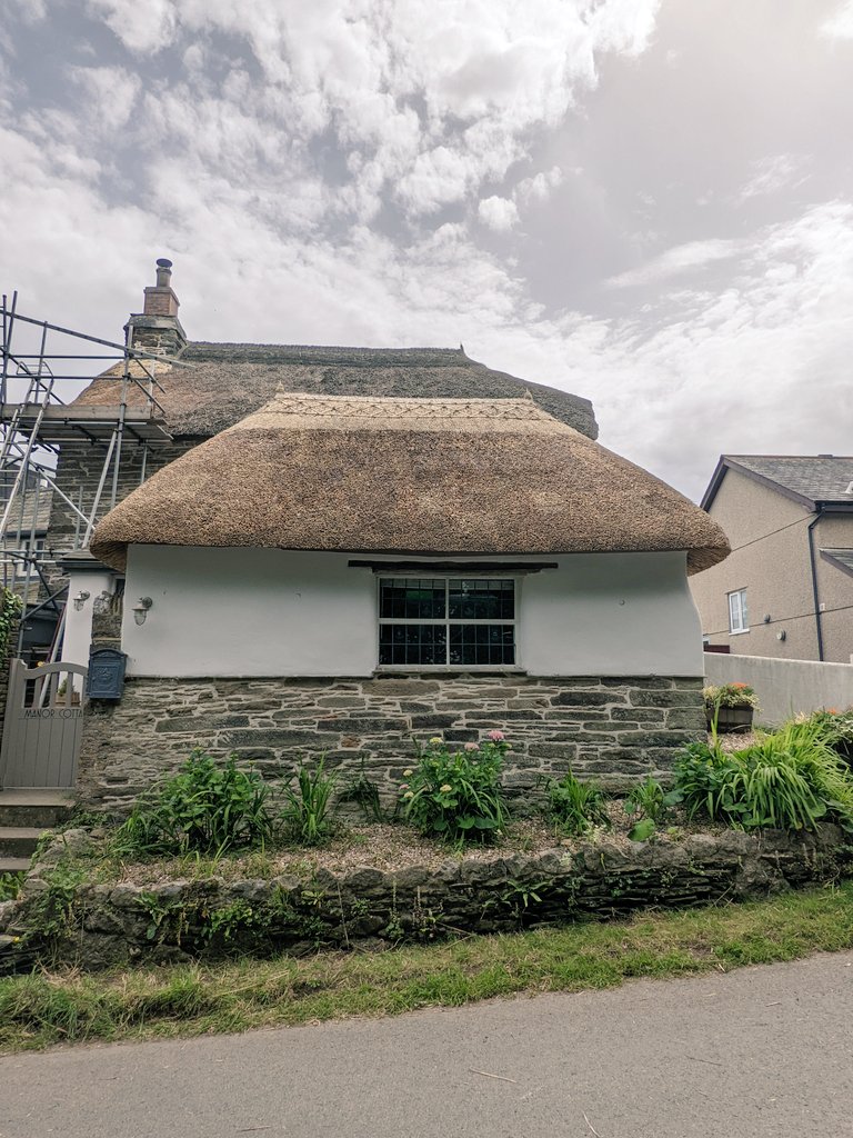 A lovely little roof to work on - the old cobbler's shop in the village of South Milton. The 'sticky up' finial ends are quite typical in this part of South Devon. I cut the hazel used to form their points from a hedge a hundred metres from the roof