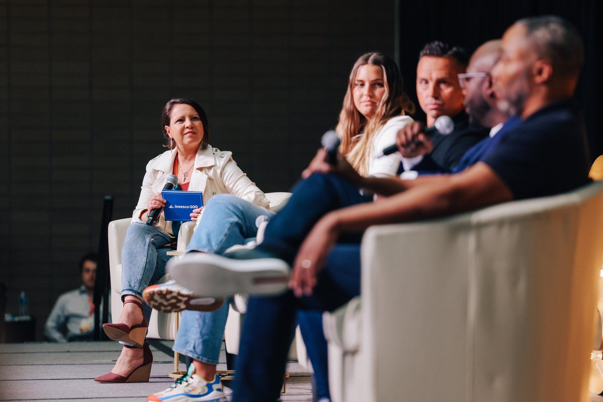InvescoUS's tweet photo. We had a blast at the inaugural @inflcr NIL Summit in Atlanta, connecting with student-athletes during panel discussions and at the Invesco QQQ #HowNotToSuckAtMoney lounge space. Conversation revolved around #financialliteracy #diversityandinclusion #personalbranding and more. https://t.co/tzb1BI62Zz