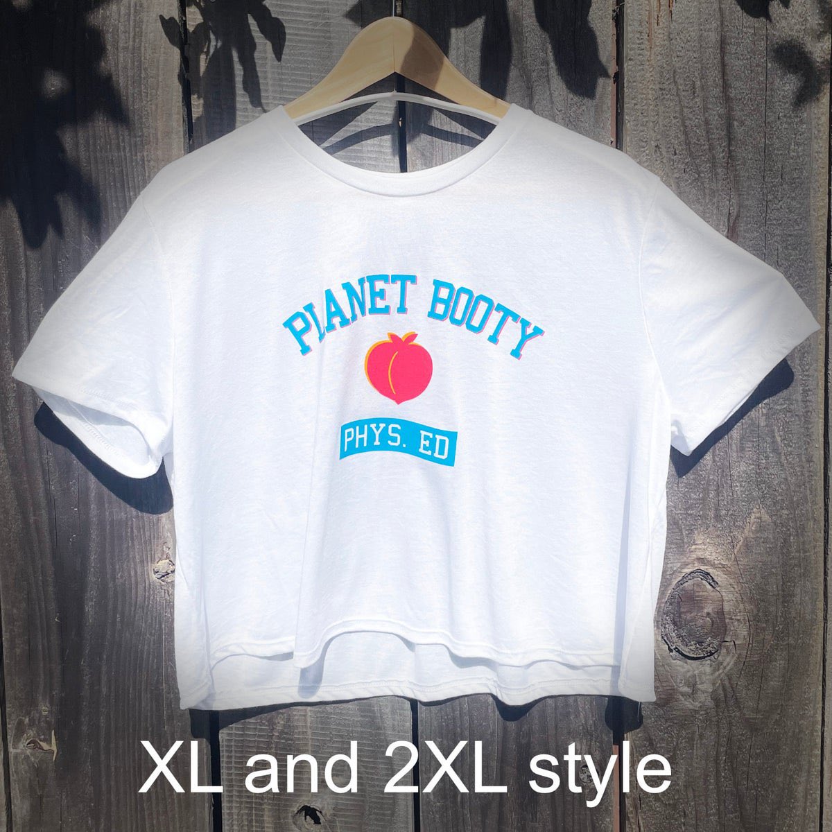 For when you want to tell the world where you get your self confidence and that you wear whatever the fuck you want. Planet Booty Phys. Ed Crop tops are now available in S - 2XL at planetbooty.org. Summertime just got a whole lot sexier