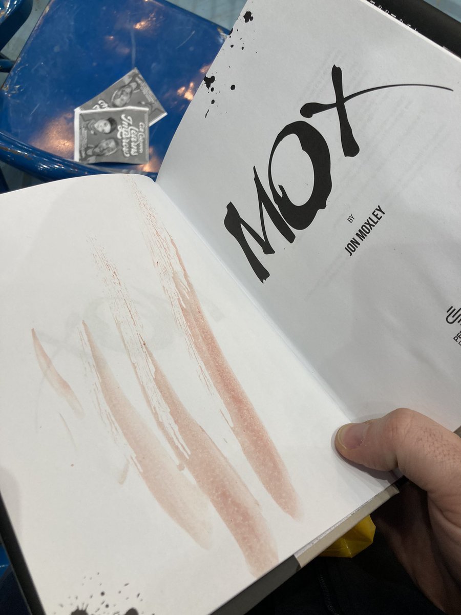 tony41483's tweet photo. @_denisesalcedo At a NJPW show, post match against Ospreay I asked if Mox would sign his book in his blood. And of course he did haha he said, “that’s fuckin awesome”. hoping one day to get him to sign with regular signature as well https://t.co/GsT4s32P1A