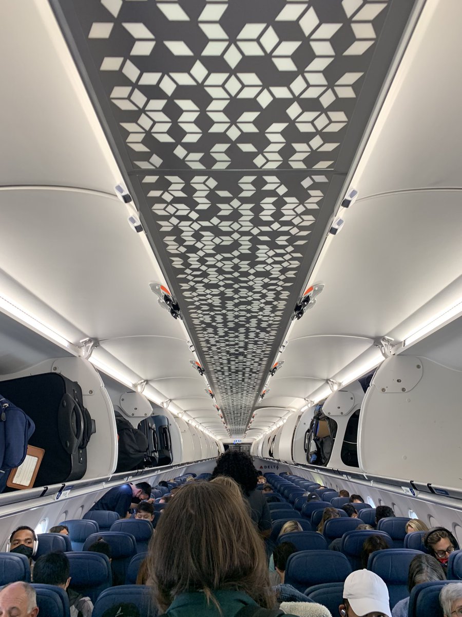katml23's tweet photo. Love when @Delta announces bins are full and makes you gate check and you board to see this https://t.co/O2yJqimIKg