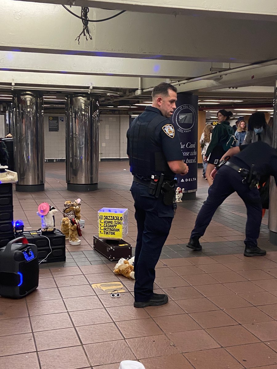 just saw a subway performer who’s whole thing is playing the saxophone for robotic dancing cats get arrested by 6 cops for what appeared to be a permit issue. his instagram, venmo, cash app, and tik tok is @/jazzajilo. please go show him some love. fuck the nypd. pic from after.