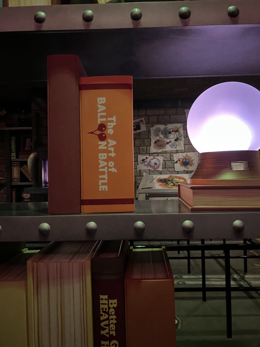 FarmboyinJapan's tweet photo. The queue takes you through various areas of Bowser’s castle. I loved the attention to detail, like how Koopa has books such as “The Art of Balloon Battle” and “Better Golf for Heavy Hitters” in his library. 

Also, I absolutely need a piranha plant stained glass lamp. https://t.co/dTS0GMfxw6