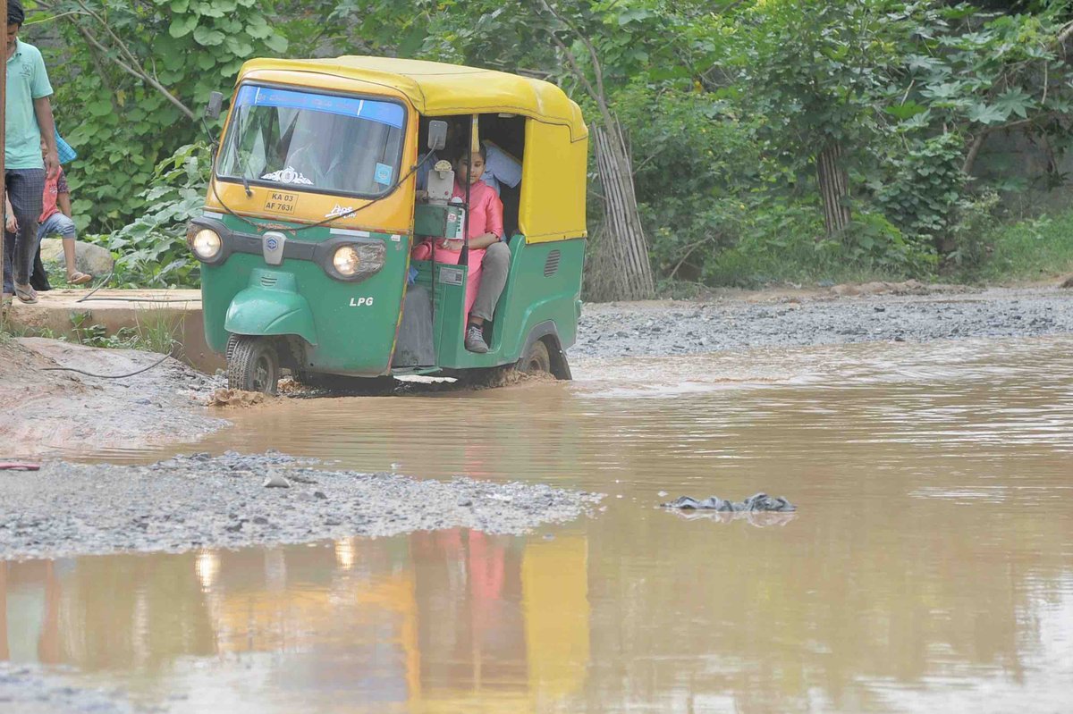 BangaloreMirror's tweet photo. Making a Splash | Bad roads or obstacle race in Bengaluru's IT corridor  - 2/2
https://t.co/m46WFRYVaT https://t.co/KVGaU0XcHS