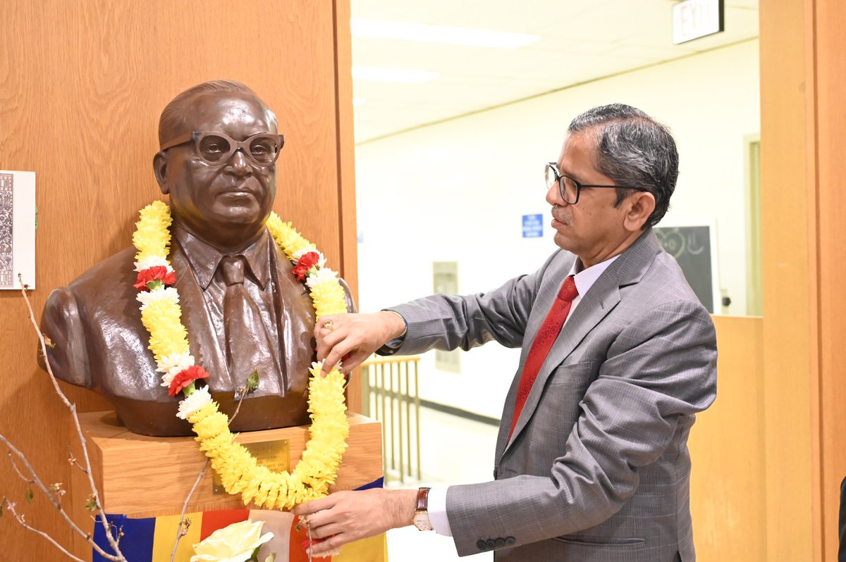 LiveLawIndia's tweet photo. Chief Justice of India NV Ramana pays floral tributes to Dr. Ambedkar at his bust situated in the library of Columbia University, USA. https://t.co/ZezBTUhlEp