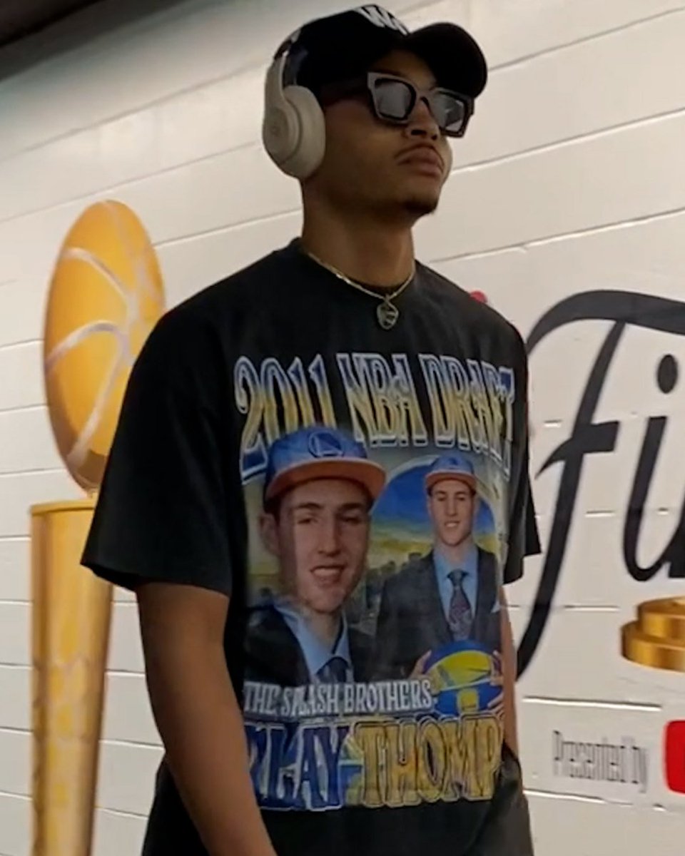 espn's tweet image. Jordan Poole walked into TD Garden with this 2011 Klay shirt 👀