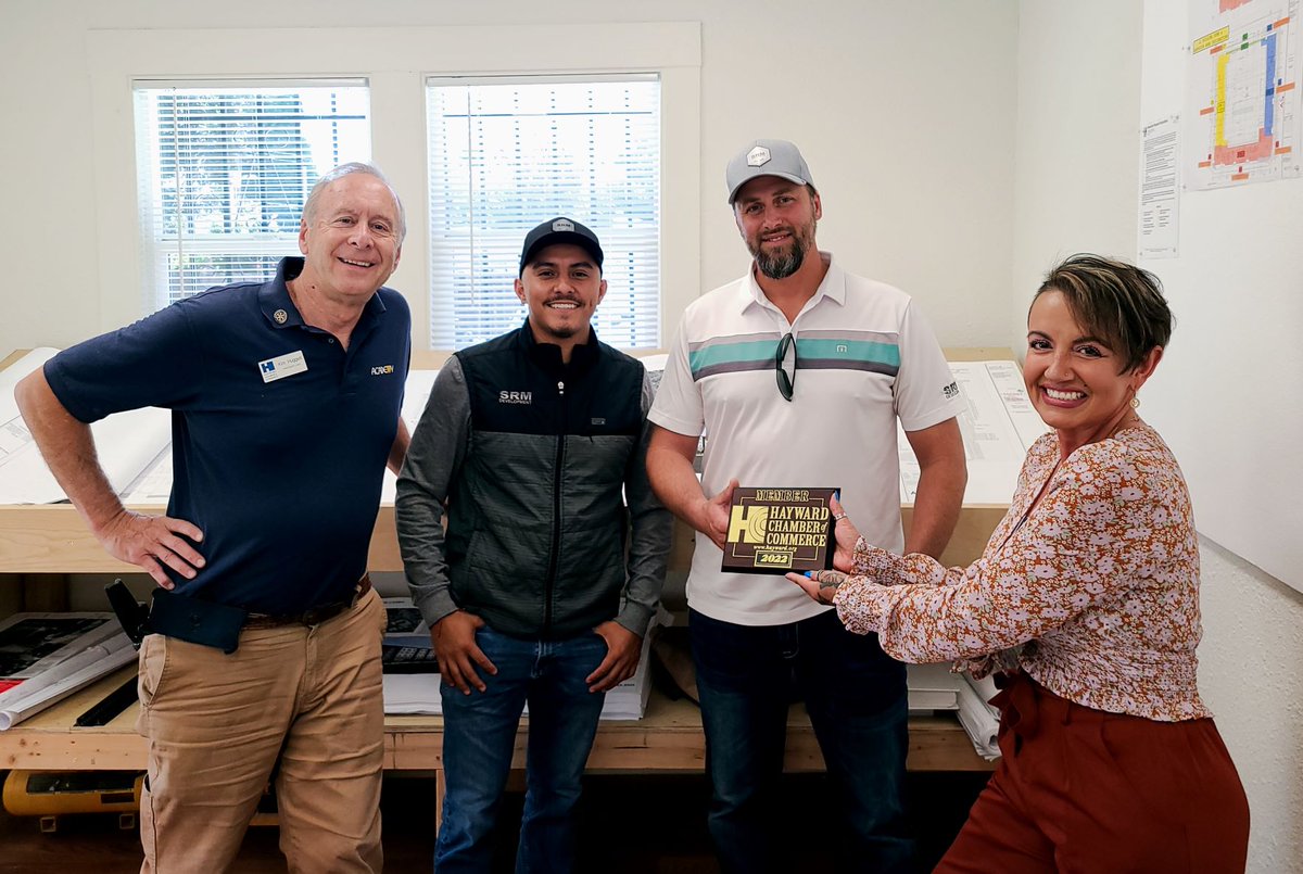 Welcome to the Hayward Chamber of Commerce SRM Development! Celebrating their status as new members are chamber president Kim Huggett, SRM's Jesus Coronado and Peter Friis, and chamber membership director Elke Poness. SRM is building a senior living facility at 2nd and A streets.