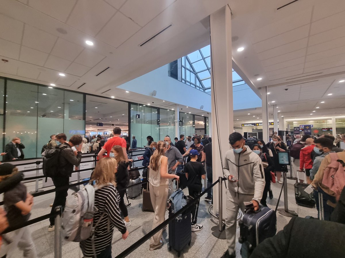 annmaya314's tweet photo. @yulaeroport @British_Airways Workers were there and just waiting. I was here for hours. Now I'm in this mess of a security line.:( https://t.co/M8LvmTUNog