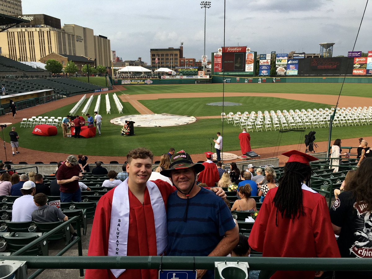 thefirkster's tweet photo. At one point he couldnโt wait for HS to be over - after what theyโve been through as kids now he & his friends donโt want it to end. Itโs so PERFECT that Travisโs graduation is being held on a baseball field. Thank you @RocRedWings #FrontierField for being a great host ๐จโ๐โพ๏ธโ๐ผโค๏ธ https://t.co/n22zXNKRua