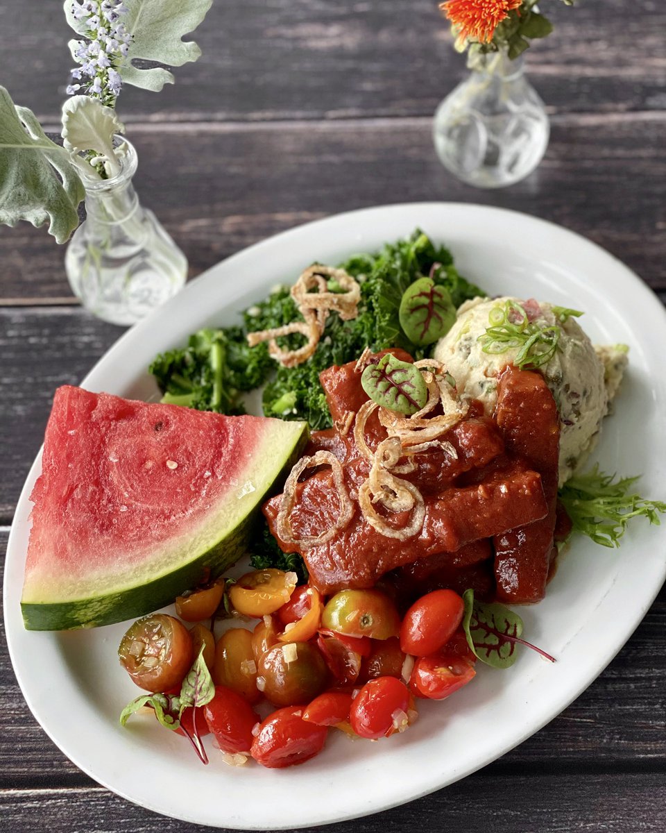 BBQ Tempeh Cookout🍉Smothered tempeh with potato salad, sautéed kale, tomato chutney and watermelon. Come check out our summer menu or order online✨