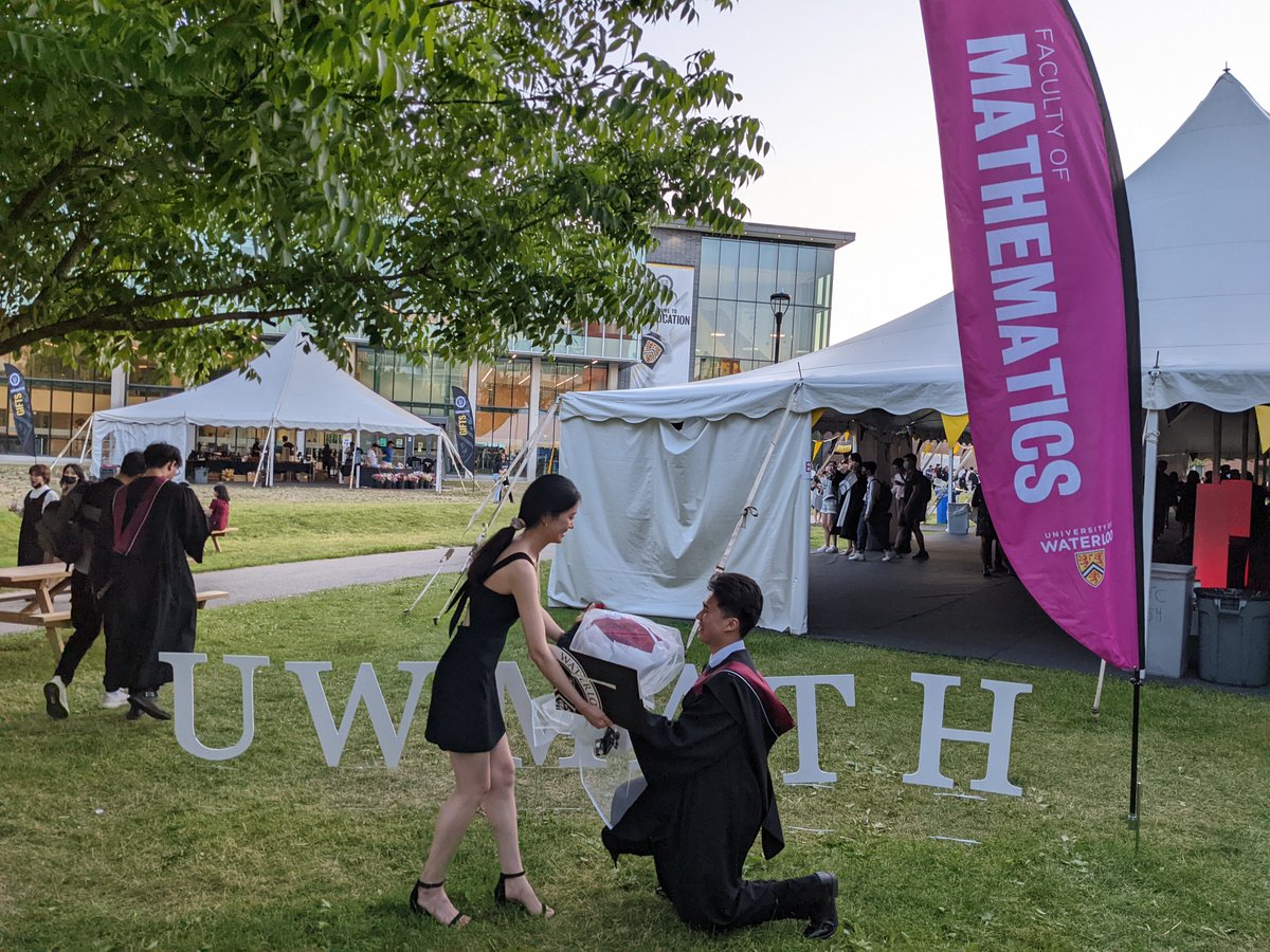 WaterlooMath's tweet photo. A #mathie proposal to end a day of convocation ceremonies! Congratulations to the happy couple!💍✨ https://t.co/7F8mwLl8ST