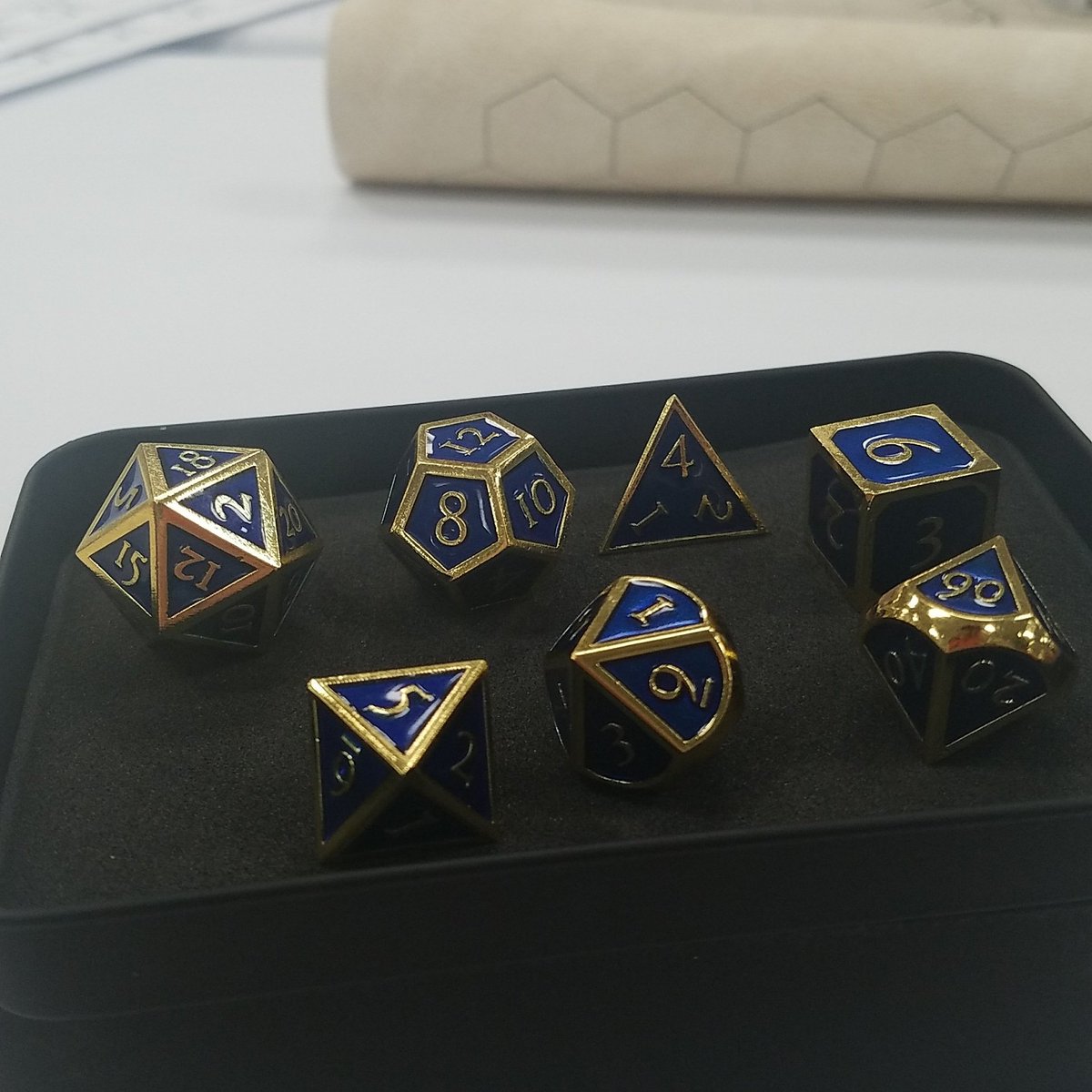 Sea_Dot_Bass's tweet photo. @VividVivka This is my set of metal dice I got at DragonCon when my wife and I cosplayed as Lady Jaina and King Anduin. #Dice #WoW #ForTheAlliance https://t.co/m2fZTGC0eq