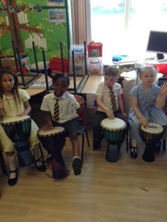 Y1OLOL's tweet photo. Year 1 have been enjoyed our Music lessons. Here they are practising on the djembe drums! @OLOLCPrimary https://t.co/1Zc2ZqJMpj