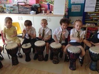Y1OLOL's tweet photo. Year 1 have been enjoyed our Music lessons. Here they are practising on the djembe drums! @OLOLCPrimary https://t.co/1Zc2ZqJMpj