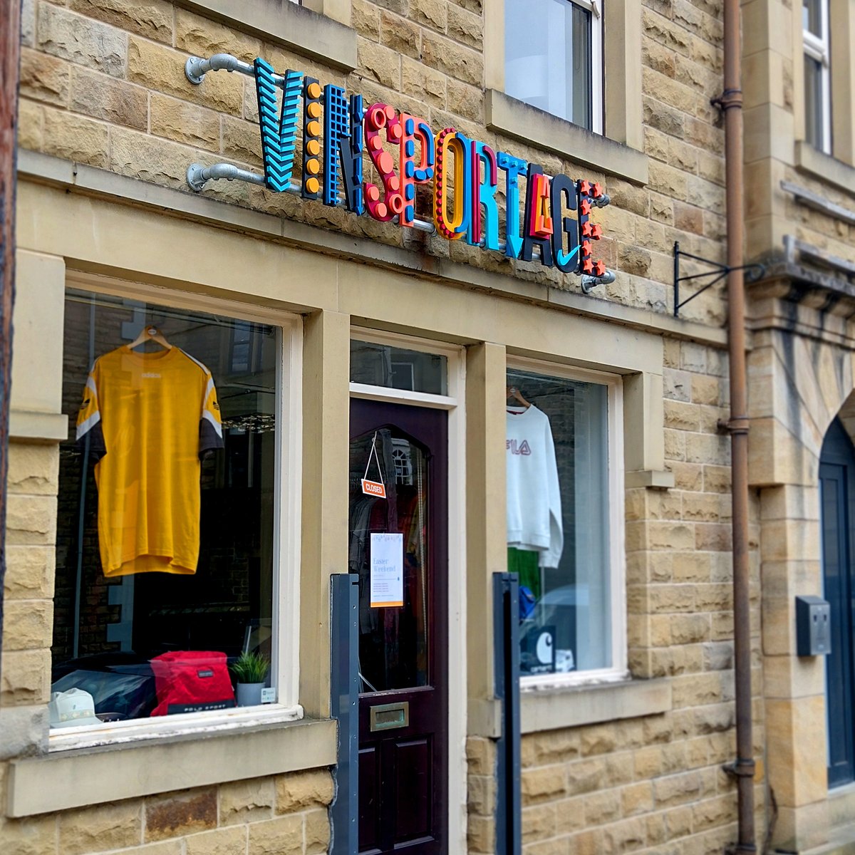 DukeMakes's tweet photo. The shop front sign we made for the vintage sportswear shop Vinsportage in Hebden Bridge! 

The designed was created by @Aimeegrundell whose work always gets us excited 👏

The #RunCNC did a great job cutting this exterior sign. It looks fantastic seeing it installed! https://t.co/Yz74sK33vt