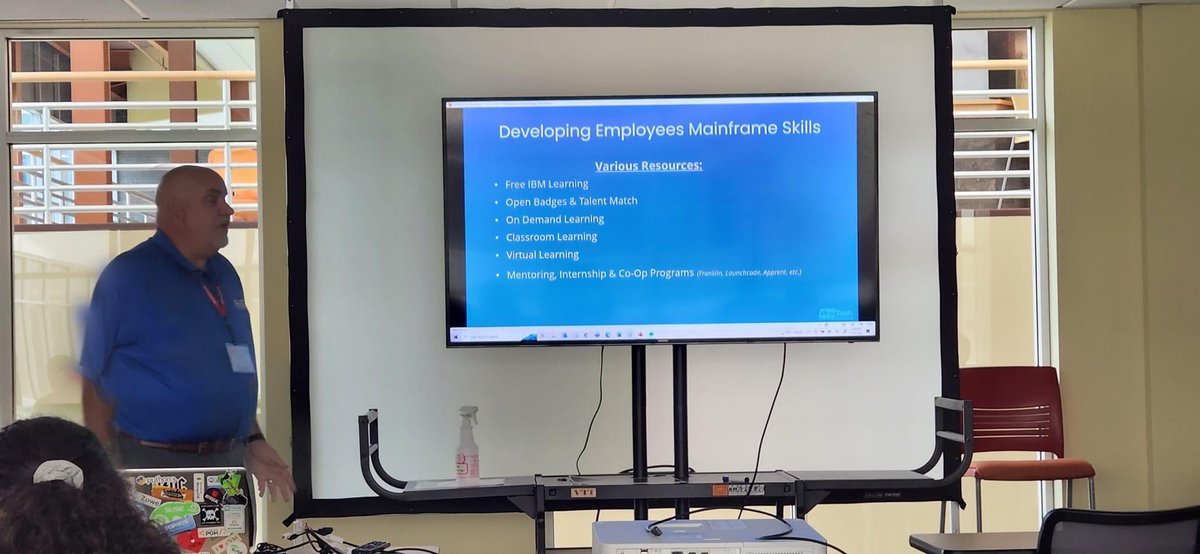 SRMcFall's tweet photo. Addressing The Mainframe Skills Shortage session @VM_Workshop Thanks to all who attended especially 16yr old Enzo who has a z14 in his garage! #mainframeskills #ibmchampion #znextgen https://t.co/nr8BphIHEm