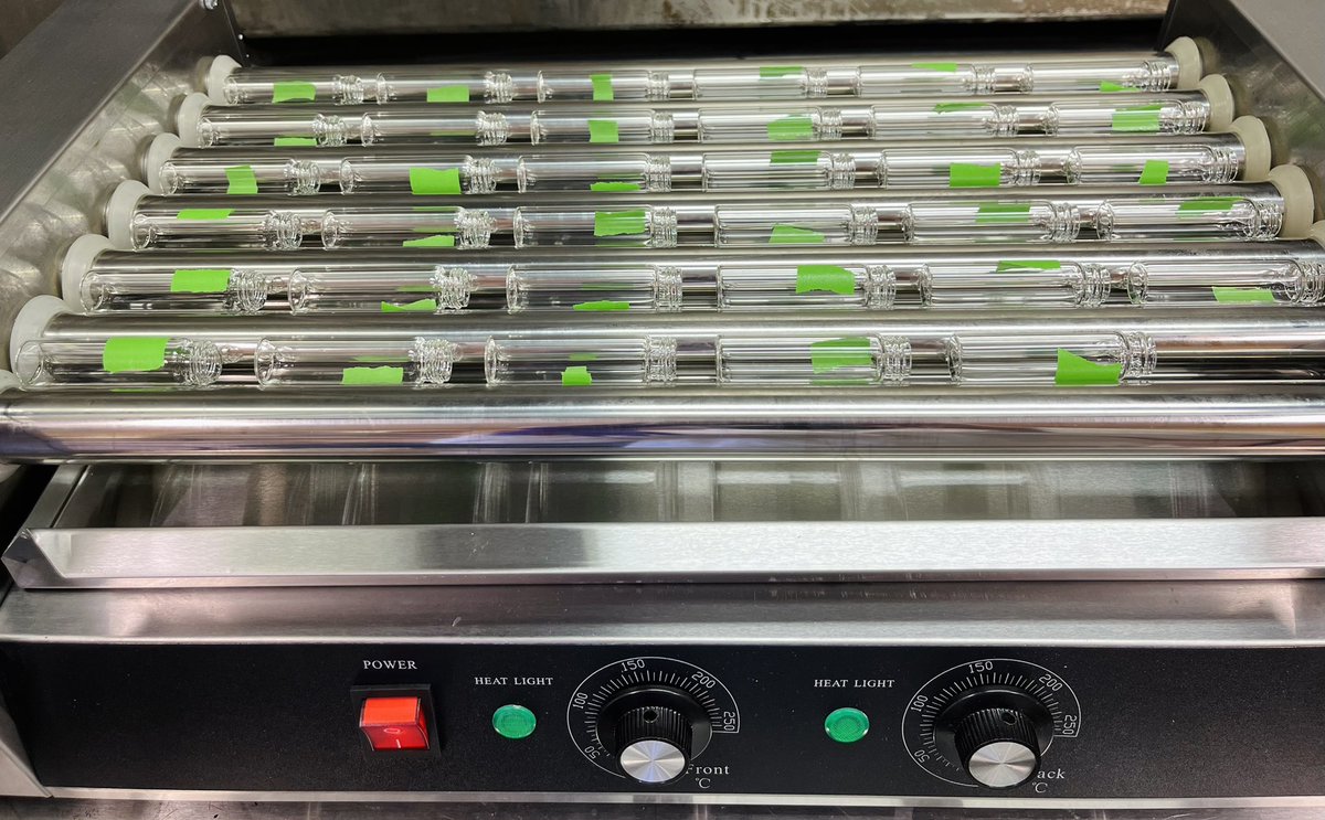 Coating the glass vials with insecticide on a hot dog roller! #fridayfun