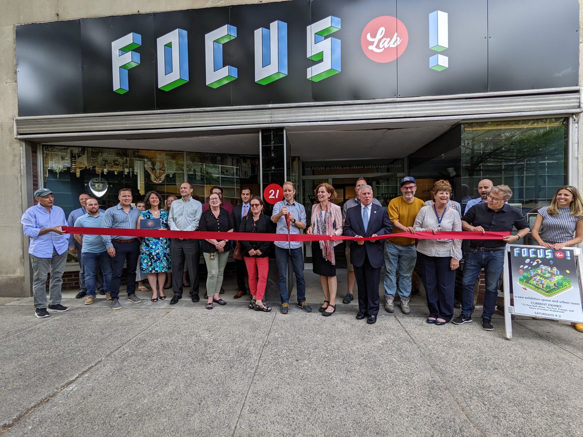 futuresmallcity's tweet photo. Amazing ribbon-cutting for the FOCUS Lab yesterday in Downtown Troy! #urbanroom #bigscissors Thank you to all the collabs: @TroyCityHall @johnmcdonald108 @PatriciaFahy109 @togakidsmuseum @SiemensUSA @CommFound518 @nationalgridus @rpi @RenscoChamber @defactoglobal @TroyBID https://t.co/UrLJ5XxP19