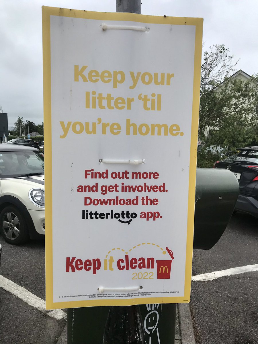 How mean can a multinational fast food corporation be? 
They create an app to help encourage you to take your/their rubbish home with you!!! 

*btw. This sign is next to a branded bin - green object behind the sign.