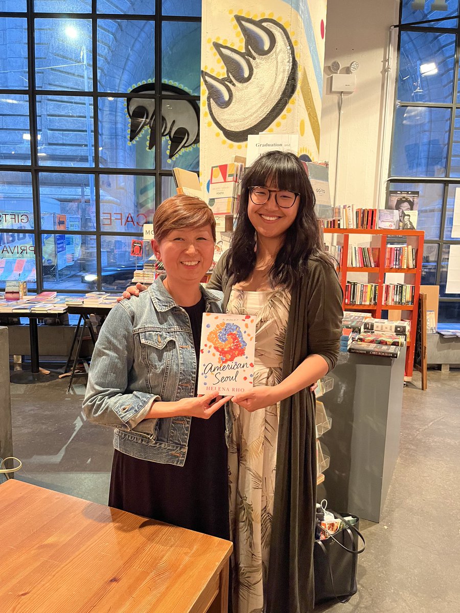 helena_rho's tweet photo. The smile stretching your face when your book agent—the best in the biz!—comes to your book launch. Thanks @amylizbishop !! This book wouldn’t exist without you. @AmazonPub #AmericanSeoul https://t.co/XczeflVLvT