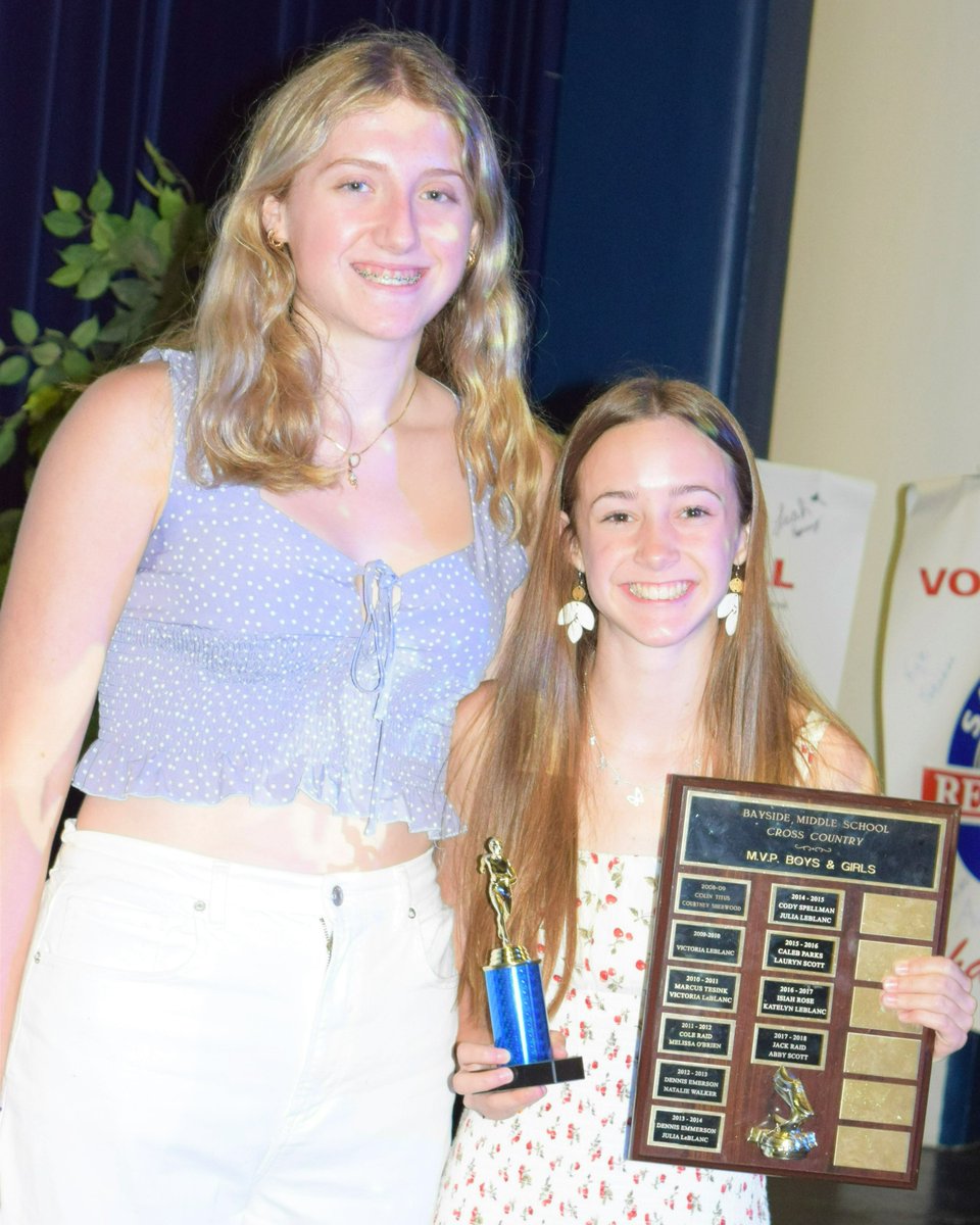TheOriginalMsA's tweet photo. 2020 Female Athlete of the Year, Clancy McIntyre returned to Bayside last Thursday to award Madison Buchanan with the MVP Award for Cross Country. 😃#2022athleticawards #believeandachieve https://t.co/SFWlpJcmsY