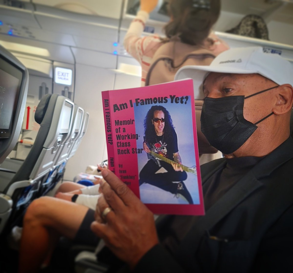 funkboynyc's tweet photo. Mr. Dave Revels says he's flound the perfect in-flight reading material: my book "Am I Famous Yet? Memoir of a Working-Class Rock Star." Thabks, Dave! Do you have your copy yet? 

https://t.co/I01rOTYF88 

#AmIFamousYet #WorkingClass #RockStar #bassplayer #music #memoir #podcast https://t.co/6E0H17Lkdy