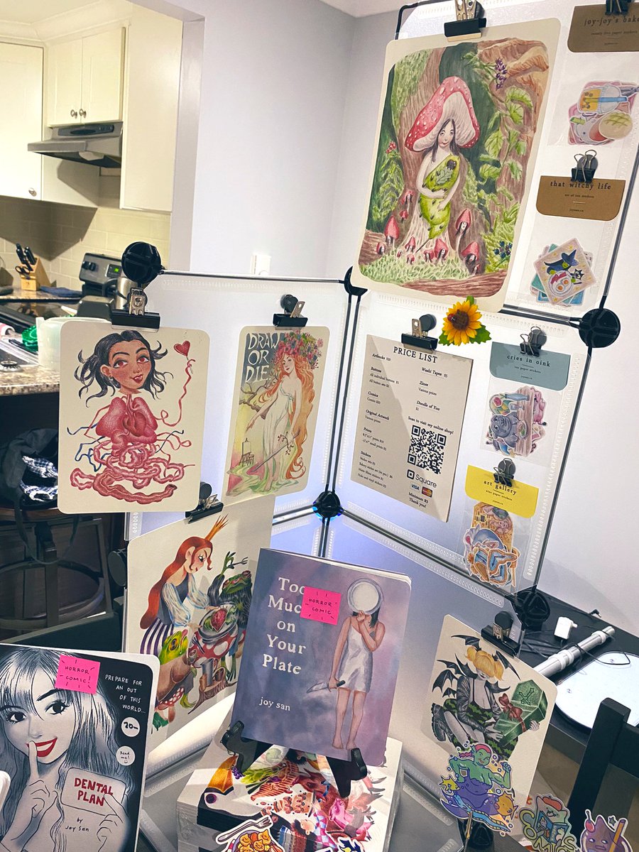 Here's my practice table set up to show you what I'll be bringing to TCAF this weekend! Get hype!!! Tons of comics and stickers and more - table 302 on the third floor 🕺🏽💃🏻 @TorontoComics 