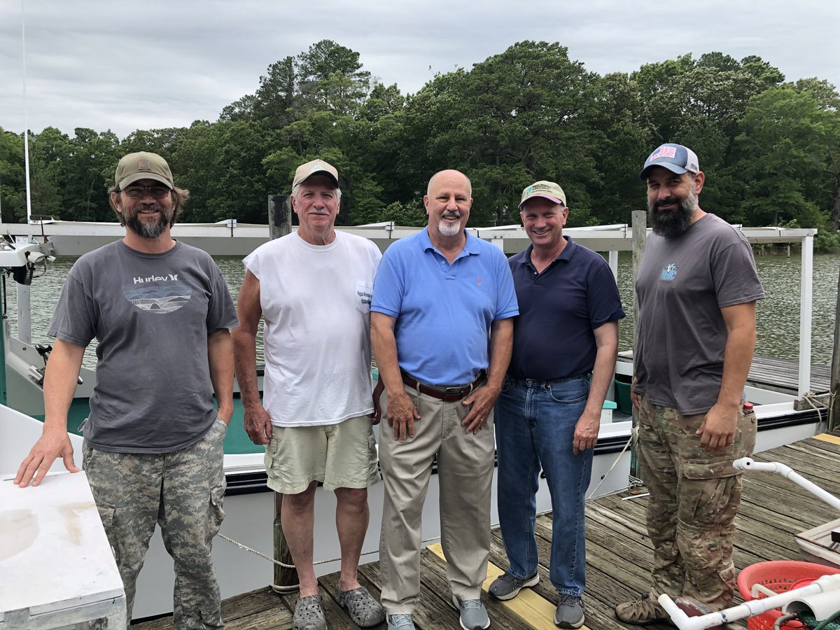 VaAgriculture's tweet photo. Commissioner Guthrie & Mike Hutt of @virginiaseafood met with Watermen JC Hudgins & Daniel Knott of the VA Waterman's Assoc. They spent the afternoon learning about the marine products industry and even went out to check on some crab pots! #VaAgWeek https://t.co/vJw2H9idnc