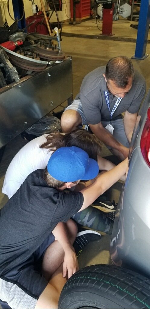 Our <a href="/EtowahHS/">Etowah High School</a> THRIVE students got 'hands-on' today and learned a valuable life skill - how to change a tire!!! It was a fun way to wrap up the last day of our summer program. #CCSDTHRIVE