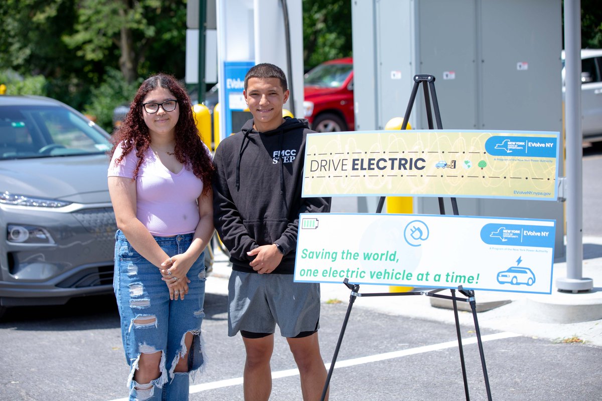 NYPAenergy's tweet photo. Two Amsterdam High School students were recognized today for their winning designs in the "DRIve #EV Downtown" bumper sticker contest designed to promote #electricvehicle driving and highlight the need to reduce our carbon footprint in #NYS. 

Read more: https://t.co/3SZ2EDJrbw https://t.co/IfqztEmJbD
